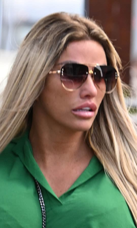 Katie Price swears at reporters outside court