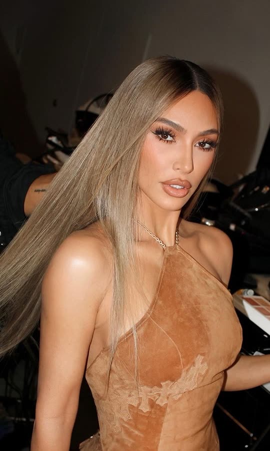 Kim is beautiful in beige