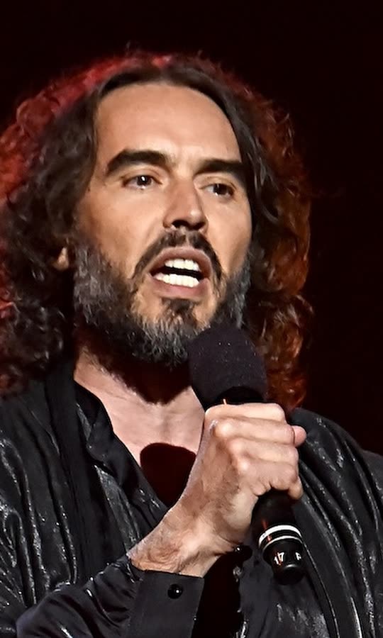 Russell Brand Questioned by UK Police Over...